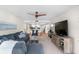 Open living room with view to the kitchen and comfortable seating arrangement at 5055 Gulf Of Mexico Dr # 414, Longboat Key, FL 34228