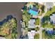 Aerial view of the property, showcasing its waterfront location and private boat dock at 5206 18Th E Ave, Bradenton, FL 34208
