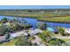 Aerial view featuring home with waterfront access, scenic river and lush mangrove surroundings at 5206 18Th E Ave, Bradenton, FL 34208