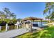 Private boat dock featuring a tiki hut, perfect for waterfront entertainment and relaxation at 5206 18Th E Ave, Bradenton, FL 34208
