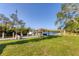 A private dock with a tiki hut provides a scenic waterfront retreat at 5206 18Th E Ave, Bradenton, FL 34208