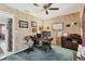 Spacious office featuring a desk with computer, cabinets, and light-green carpet at 5206 18Th E Ave, Bradenton, FL 34208