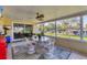 Waterfront patio with a seating area and lush backyard views at 5206 18Th E Ave, Bradenton, FL 34208