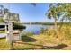 Picturesque view of serene waterway with lush greenery and waterfront access at 5206 18Th E Ave, Bradenton, FL 34208