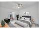 Comfortable bedroom with a ceiling fan and sliding glass door at 5382 Royal Palm Ave # 5382, Sarasota, FL 34234