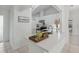 Bright kitchen features white cabinetry, sleek countertops, and modern appliances creating an open and inviting space at 5382 Royal Palm Ave # 5382, Sarasota, FL 34234