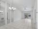 Bright living room featuring ceramic tiles and neutral paint at 5382 Royal Palm Ave # 5382, Sarasota, FL 34234