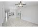Bright living room featuring ceramic tiles and neutral paint at 5382 Royal Palm Ave # 5382, Sarasota, FL 34234
