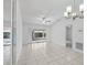Bright living room featuring ceramic tiles and neutral paint at 5382 Royal Palm Ave # 5382, Sarasota, FL 34234