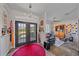 Bright foyer with double doors, stylish decor, and an open view to the living area at 5554 Eastwind Dr, Sarasota, FL 34233