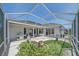 Enjoy an open patio with a fountain feature, complemented by a sleek outdoor grill at 5554 Eastwind Dr, Sarasota, FL 34233