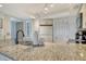 Well-lit kitchen with granite counters, a double sink and sleek stainless faucet at 5920 Midnight Pass Rd # 406, Sarasota, FL 34242
