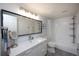 Bright bathroom featuring a shower and bathtub combination with a modern vanity at 6100 Gulfport S Blvd # 117, Gulfport, FL 33707
