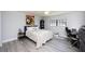 Comfortable bedroom with neutral walls, a ceiling fan, and ample natural light at 6100 Gulfport S Blvd # 117, Gulfport, FL 33707