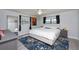 Inviting bedroom showcasing a stylish rug and soothing color palette at 6100 Gulfport S Blvd # 117, Gulfport, FL 33707
