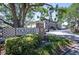 Inviting sign for Golfview Condominiums, set amid lush landscaping and mature trees at 6100 Gulfport S Blvd # 117, Gulfport, FL 33707