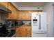 Functional kitchen equipped with modern appliances and ample cabinet space for storage at 6100 Gulfport S Blvd # 117, Gulfport, FL 33707