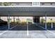 Designated covered parking area for residents, offering protection from the elements at 6100 Gulfport S Blvd # 117, Gulfport, FL 33707