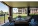 Comfortable outdoor seating area with views of the community at 6100 Gulfport S Blvd # 117, Gulfport, FL 33707