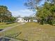 Spacious property with white home, outbuilding and secure fencing at 611 29Th E St, Bradenton, FL 34208