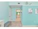 Comfortable bedroom with bright walls and an open doorway to the bathroom, creating a relaxing retreat at 6339 Bay Cedar Ln # 102, Bradenton, FL 34203