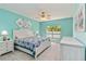 Bright bedroom featuring a ceiling fan, large window, and coordinated furnishings at 6339 Bay Cedar Ln # 102, Bradenton, FL 34203