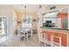 Cozy dining area adjacent to the kitchen with seating for four, perfect for casual meals and entertaining guests at 6339 Bay Cedar Ln # 102, Bradenton, FL 34203
