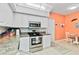 Well-equipped kitchen featuring modern stainless steel appliances and ample cabinet space, ideal for cooking and entertaining at 6339 Bay Cedar Ln # 102, Bradenton, FL 34203