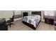 Comfortable bedroom featuring hardwood floors and a relaxing atmosphere at 6524 Willowshire Way, Bradenton, FL 34212