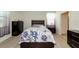 Cozy bedroom with hardwood floors and ample natural light at 6524 Willowshire Way, Bradenton, FL 34212