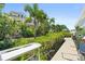 This waterfront property features a private dock with lush greenery, and is ready for boats and waterfront living at 7118 Hawks Harbor Cir, Bradenton, FL 34207