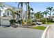 Stunning two-story home with lush landscaping, grey driveway pavers, and a two-car garage at 7118 Hawks Harbor Cir, Bradenton, FL 34207
