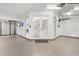 The garage is designed with direct access to the home, featuring a view of the staircase through glass doors at 7118 Hawks Harbor Cir, Bradenton, FL 34207