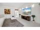 Stylish living room with modern decor, a large TV, and comfortable seating arrangements at 7118 Hawks Harbor Cir, Bradenton, FL 34207