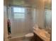 Bathroom featuring a shower and tub combination at 7461 W Country Club N Dr # 201, Sarasota, FL 34243