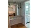 Bathroom featuring a vanity area with decorative mirror at 7461 W Country Club N Dr # 201, Sarasota, FL 34243