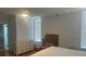 Bright bedroom with dresser and large window, great natural light at 7461 W Country Club N Dr # 201, Sarasota, FL 34243