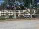 Beautiful apartment complex with mature landscaping and covered parking at 7461 W Country Club N Dr # 201, Sarasota, FL 34243