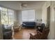 Bright living room featuring hardwood floors and lots of natural light at 7461 W Country Club N Dr # 201, Sarasota, FL 34243