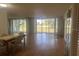 Spacious living room with natural light and view of golf course at 7461 W Country Club N Dr # 201, Sarasota, FL 34243