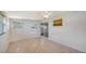 Bright bedroom with tile floors and closet at 80 Liles St, Terra Ceia, FL 34250