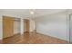 This bedroom features hard wood floors, a ceiling fan and plenty of closet space at 80 Liles St, Terra Ceia, FL 34250