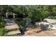 Community boat ramp leading to the waterway with natural landscaping at 80 Liles St, Terra Ceia, FL 34250