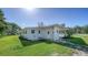 This charming single-story home has well maintained landscaping and classic architecture at 80 Liles St, Terra Ceia, FL 34250