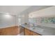 Kitchen sink featuring stone countertops and stainless steel dishwasher at 80 Liles St, Terra Ceia, FL 34250