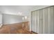 Spacious living room featuring hardwood floors, ceiling fan, and neutral wall paint at 80 Liles St, Terra Ceia, FL 34250