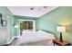 Spacious bedroom with a view of the lanai at 801 Oak Vista Dr, Sarasota, FL 34232