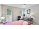 Bedroom features a ceiling fan, natural light and functional workspace at 801 Oak Vista Dr, Sarasota, FL 34232