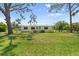 Charming single-story home with a well-manicured front lawn at 815 31St W Ave, Palmetto, FL 34221