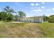 Exterior of the property showing a multi-car garage at 815 31St W Ave, Palmetto, FL 34221